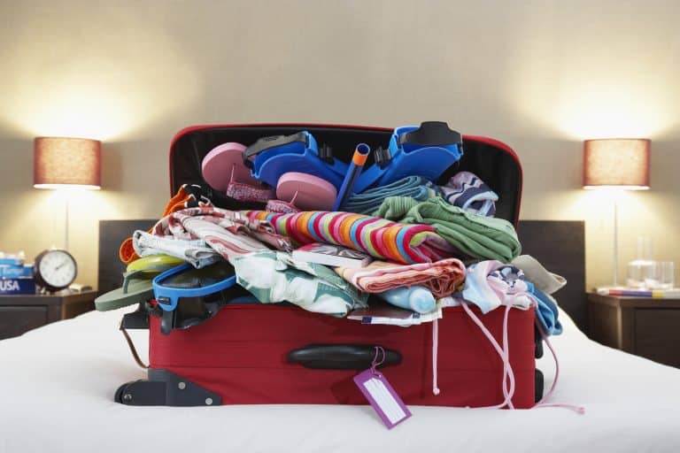 If your suitcase is overflowing like this, check out this liveaboard packing list